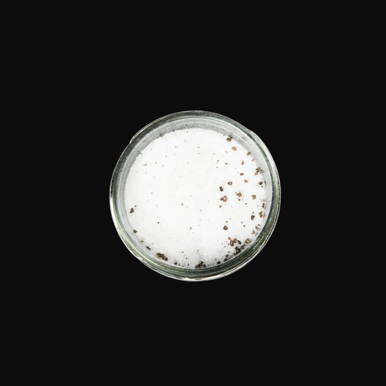 an open Imperia caviar truffle salt bottle on a white background