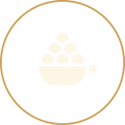 Small round icon with a light beige color and a gold border.