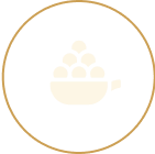 Small icon of a cake with white frosting on a gold circle background