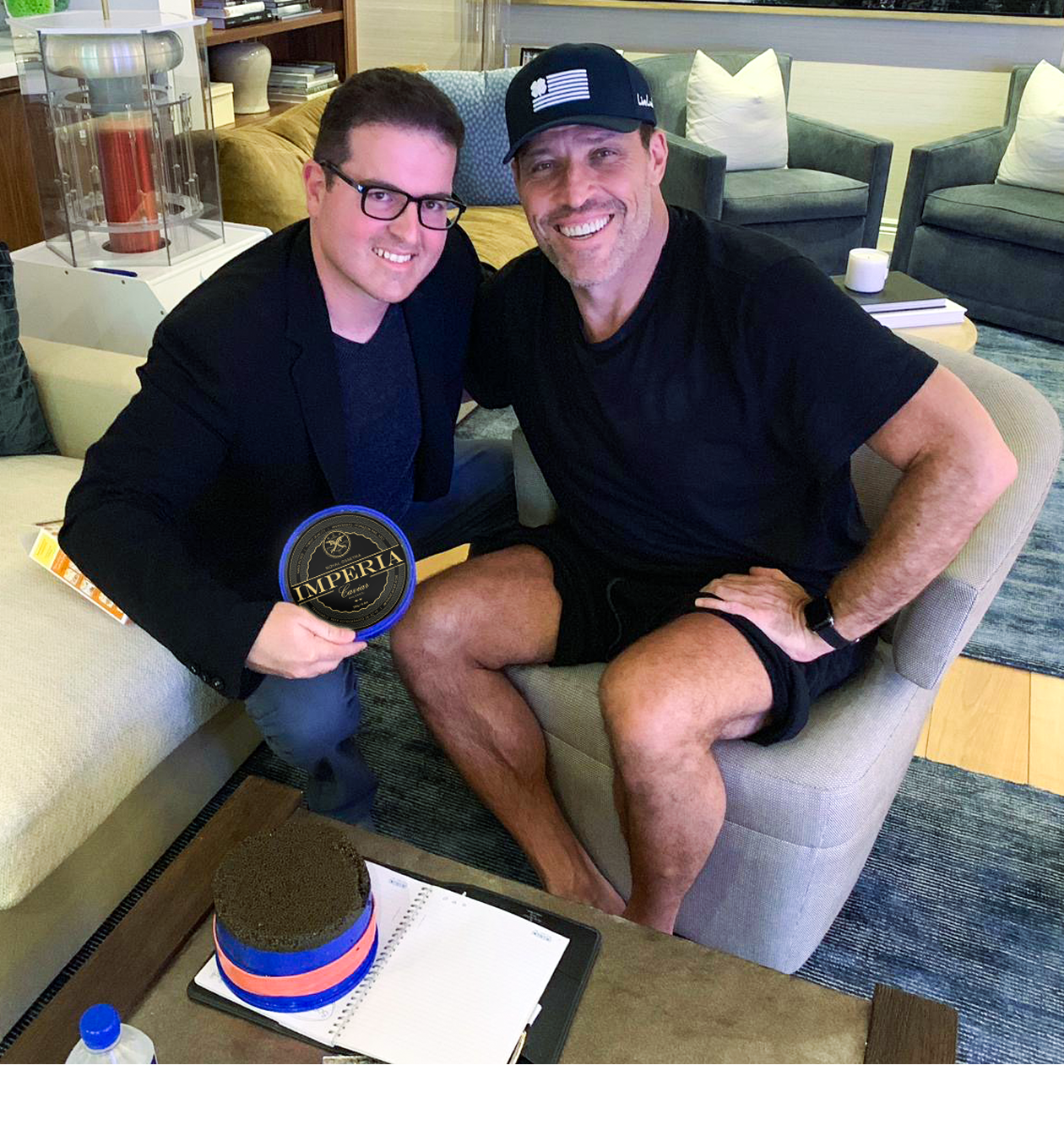 Two men sitting on a couch 
