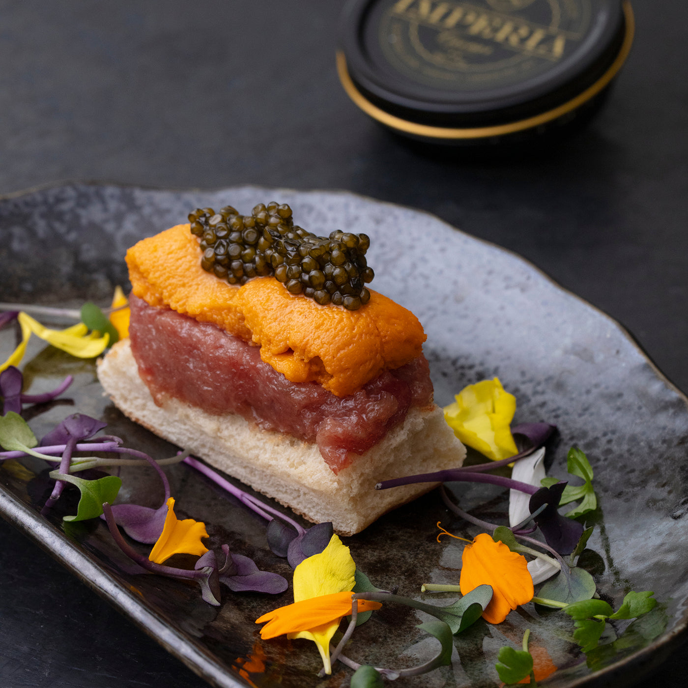What belongs on a caviar table?