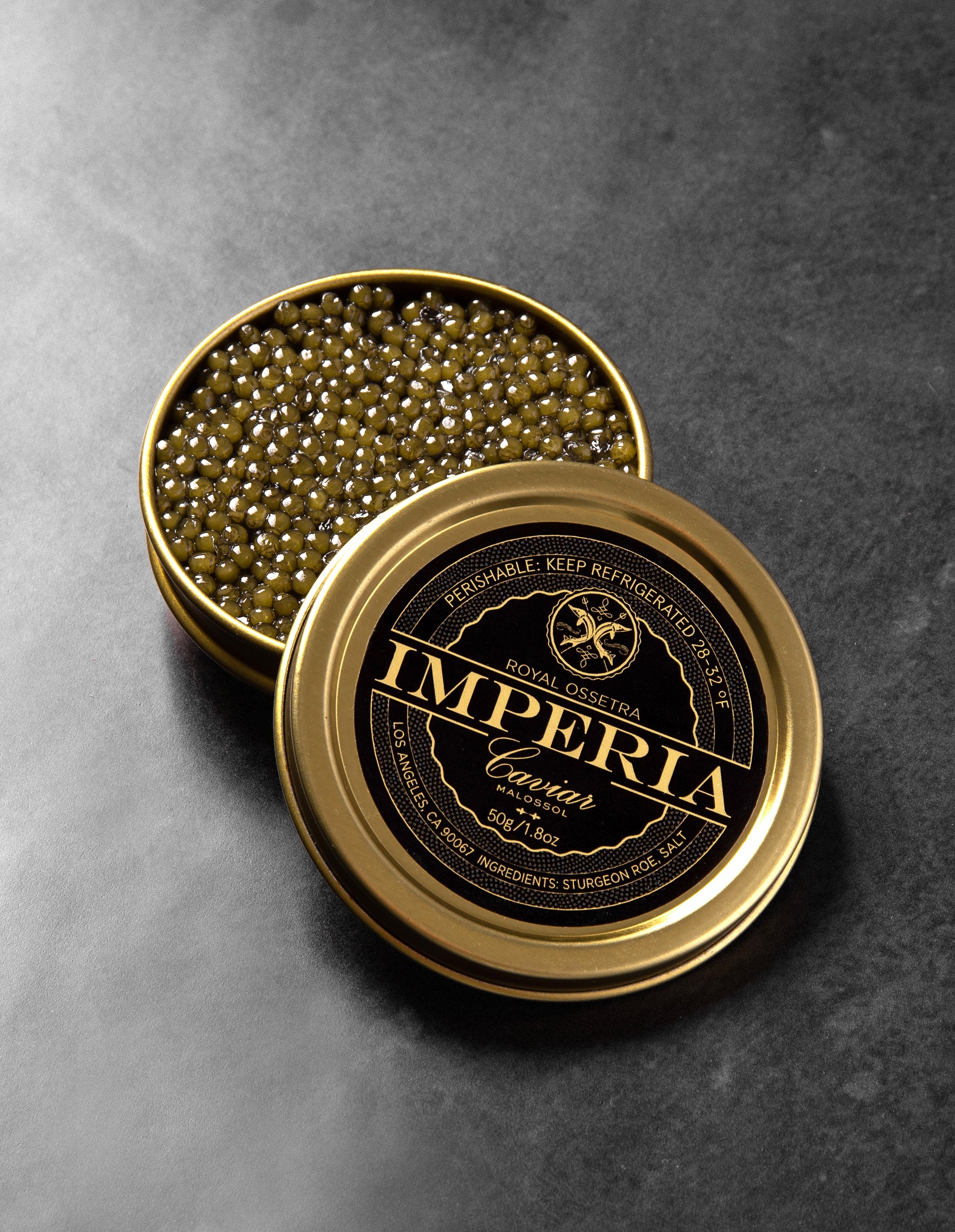 Open royal ossetra caviar from Imperia caviar on a table.